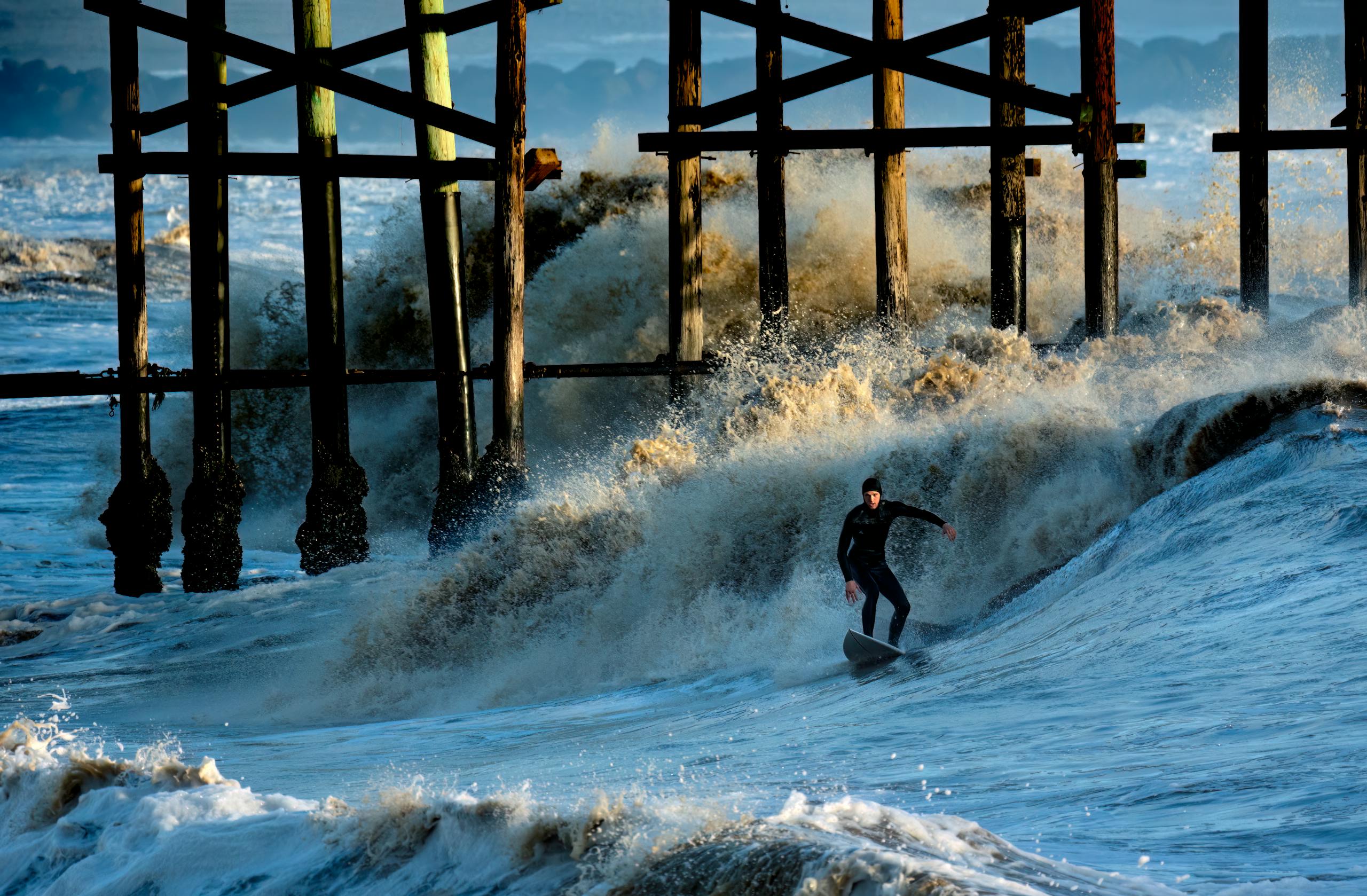 man has time to surf while digital marketing agency, justified media handles seo services ventura, ppc ventura, website design services ventura for his local surfshop